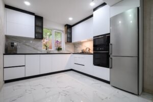 A recently renovated kitchen with sleek, modern appliances